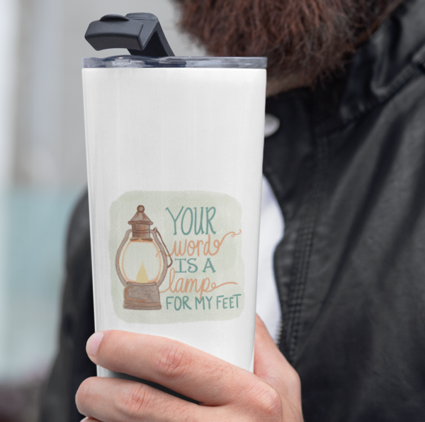 mockup of a bearded man wearing a 20 oz travel mug in winter 30383